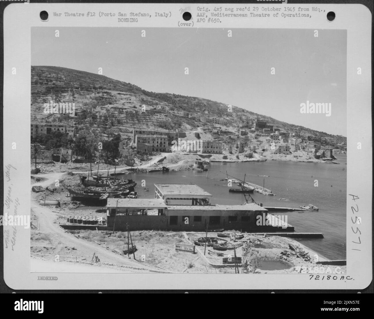 Bomb damage to harbor at Porto San Stefano, Italy. 12 May 1944 Stock