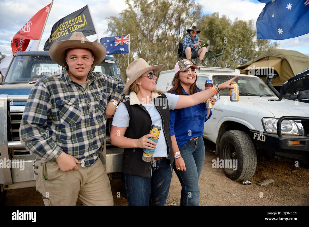 Participants take part in the annual Ute Muster celebration in the small NSW town of Deniliquin, on Friday, September 28, 2018. The Deniliquin Ute Muster celebrates all things Australian and the icon of the Ute. (AAP Image/Perry Duffin) Stock Photo