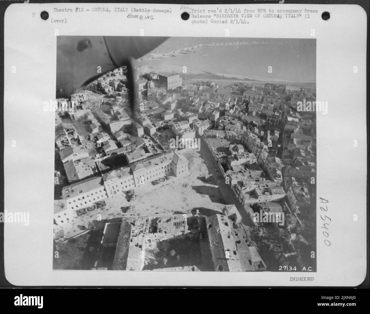 This photo of Ortona, on the Adriatic coast of Italy, was made by a reconnaissance pilot of the U.S. Army Air Forces, while the Canadians of the British 8th Army were battling for possession of the town. Three General Sherman tanks may be seen in the Stock Photo
