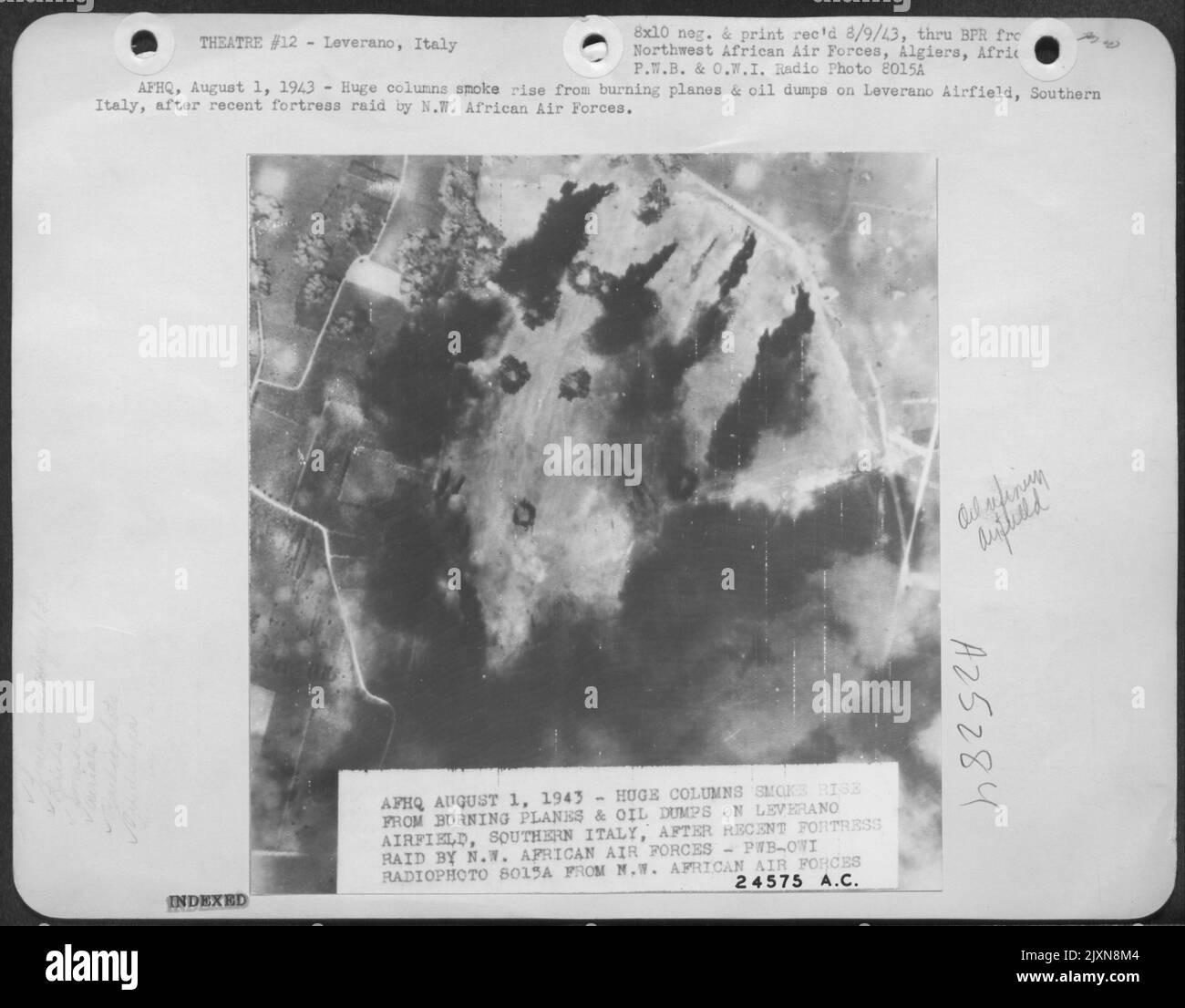 AFHQ, August 1, 1943Huge columns smoke rise from burning planes & oil