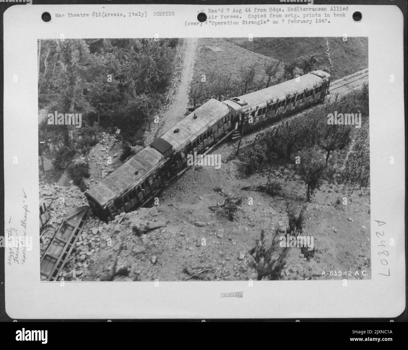 Neatly Trapped On A Low Bridge, This German Troop Train Was Blasted On The Line Between Florence And Arezzo, Italy. Stock Photo