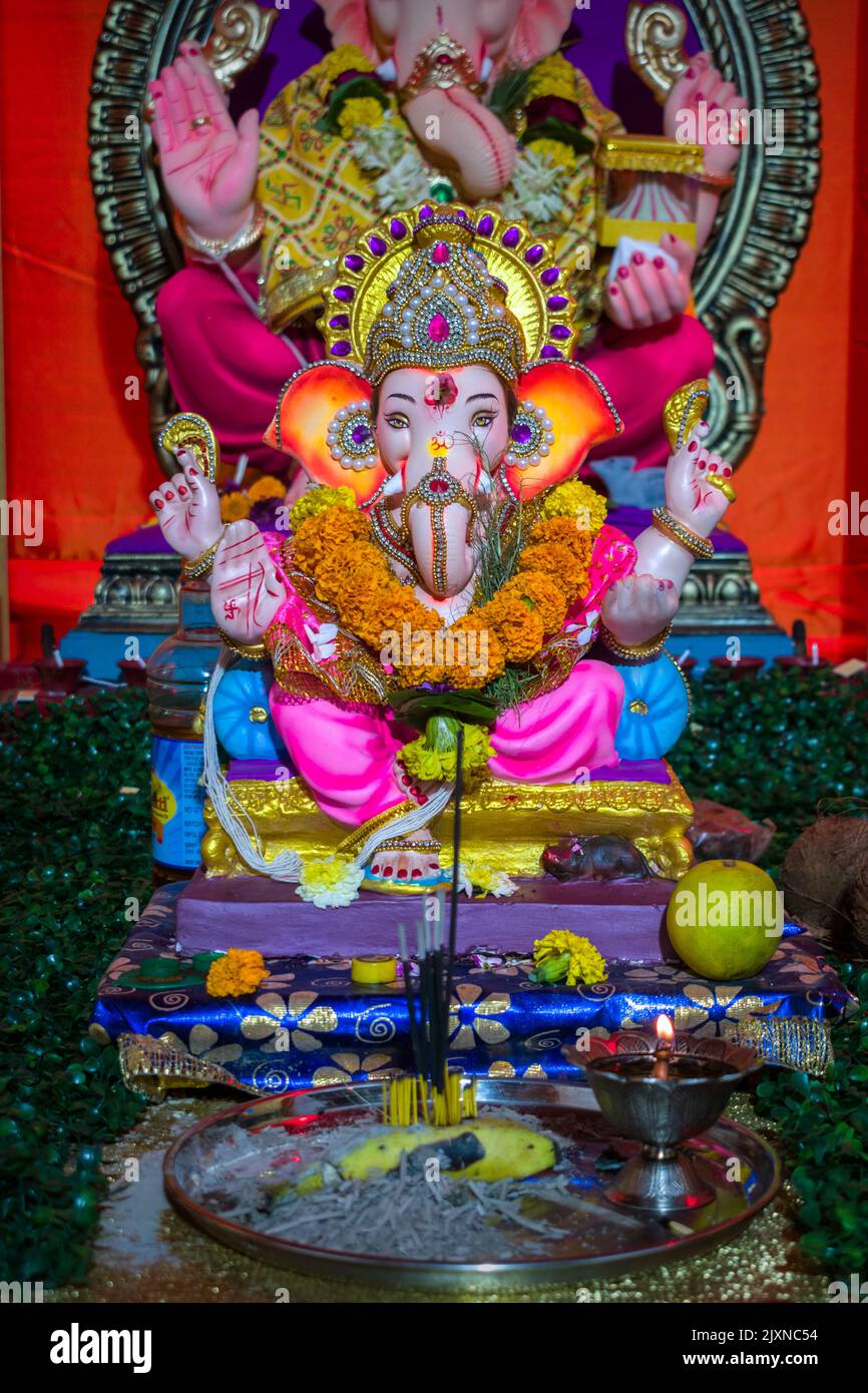 A beautiful idol of Lord Ganesha being worshipped at a mandal in Mumbai ...