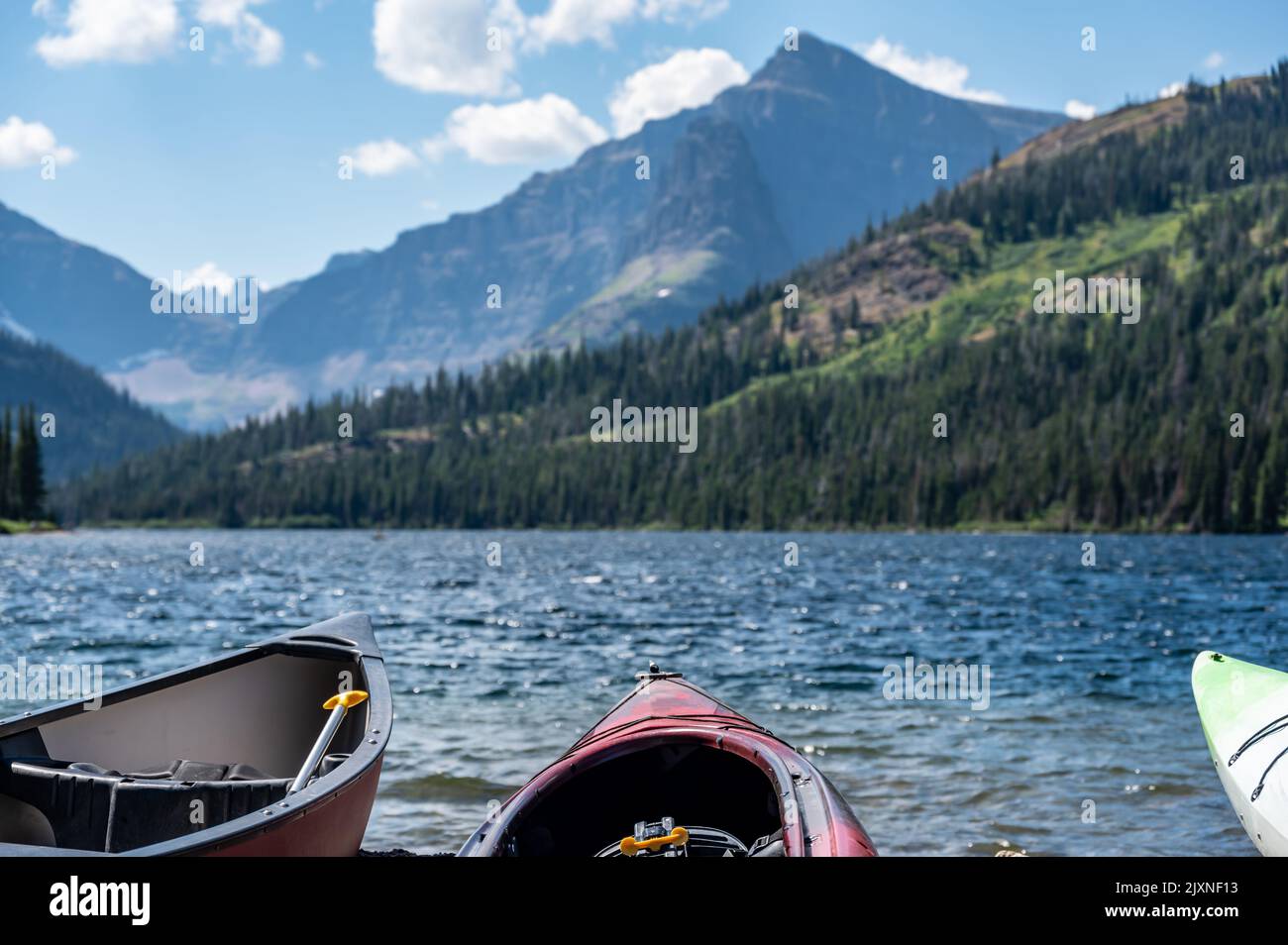 Canoe and kayak on the beach at Two Medicine lake in Glacier National