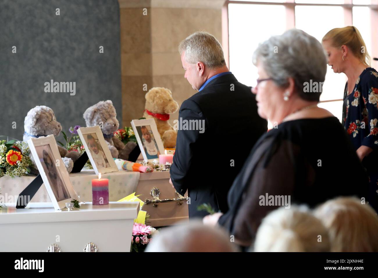 Mourners pay their respects during the funerals of Beverley Quinn, Mara