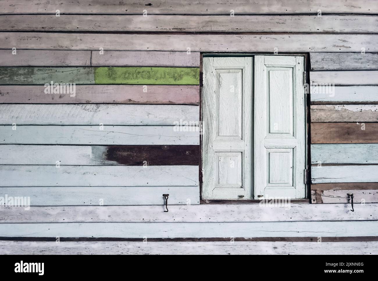 Old grunged wooden window frame painted white vintage with old