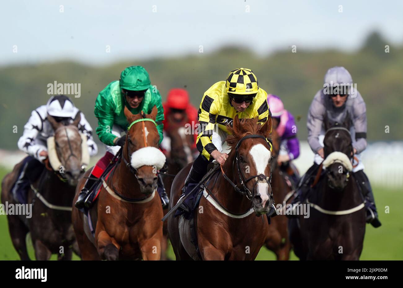 Manaccan ridden by Ryan Moore on their way to winning the Cazoo Scarbrough Stakes on day one of The Cazoo St Leger Festival at Doncaster Racecourse. Picture date: Wednesday September 7, 2022. Stock Photo