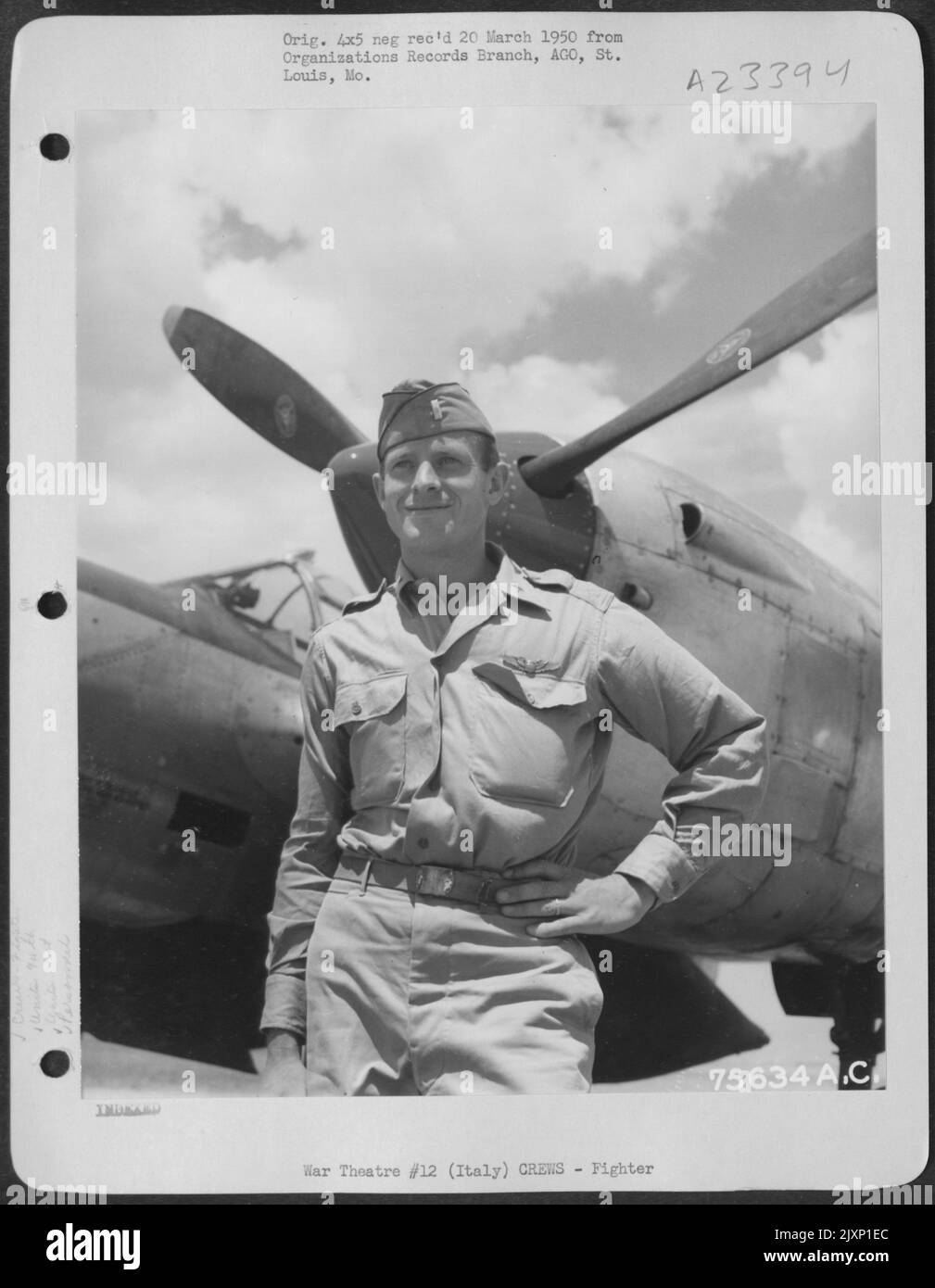 Lt. Austin Of The 94Th Fs, 1St Fg, Stands Beside His Lockheed P-38 Lightning At An Air Base In Italy. Stock Photo
