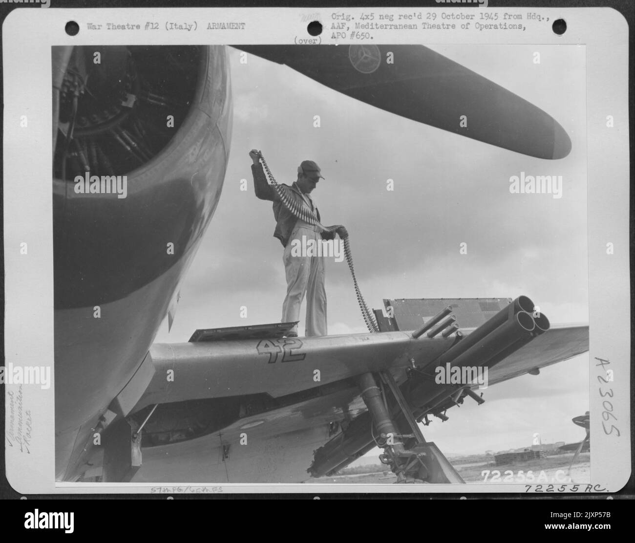 An Armorer Loads Ammunition In The Wing Republic P-47 Thunderbolt Of