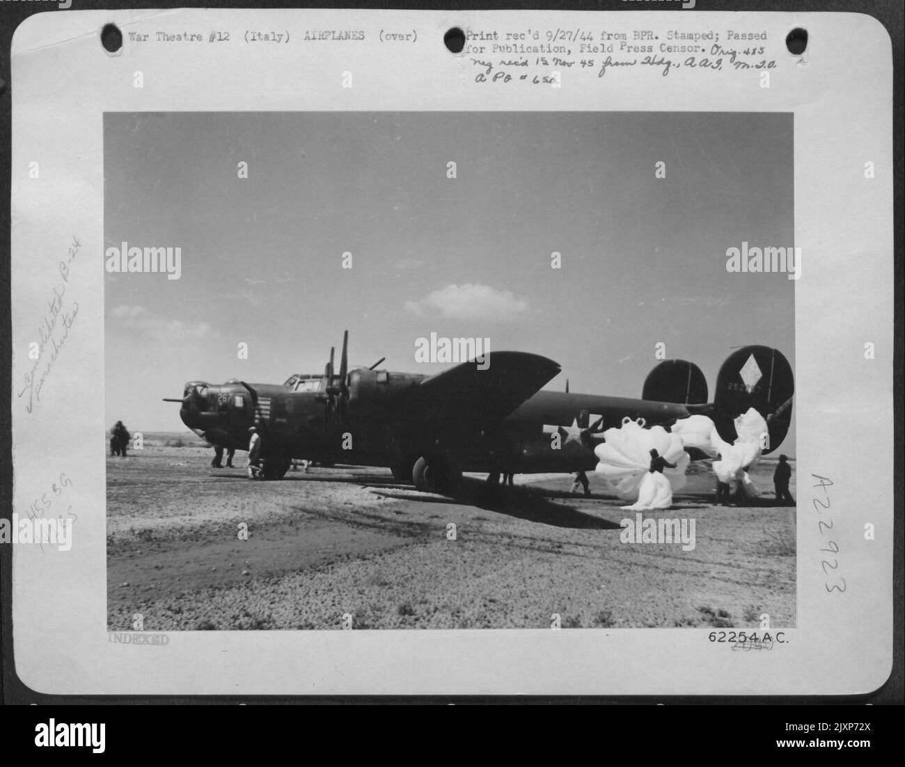 Its Hydraulic System Shot Out By Flak Over The Ferrara Railroad Bridge In Northern Italy, This Consolidated B-24 Liberator Bomber Of The 15Th Af Landed With The Aid Of Parachutes Preventing The Lib From Overshooting The Landing Strip. Stock Photo