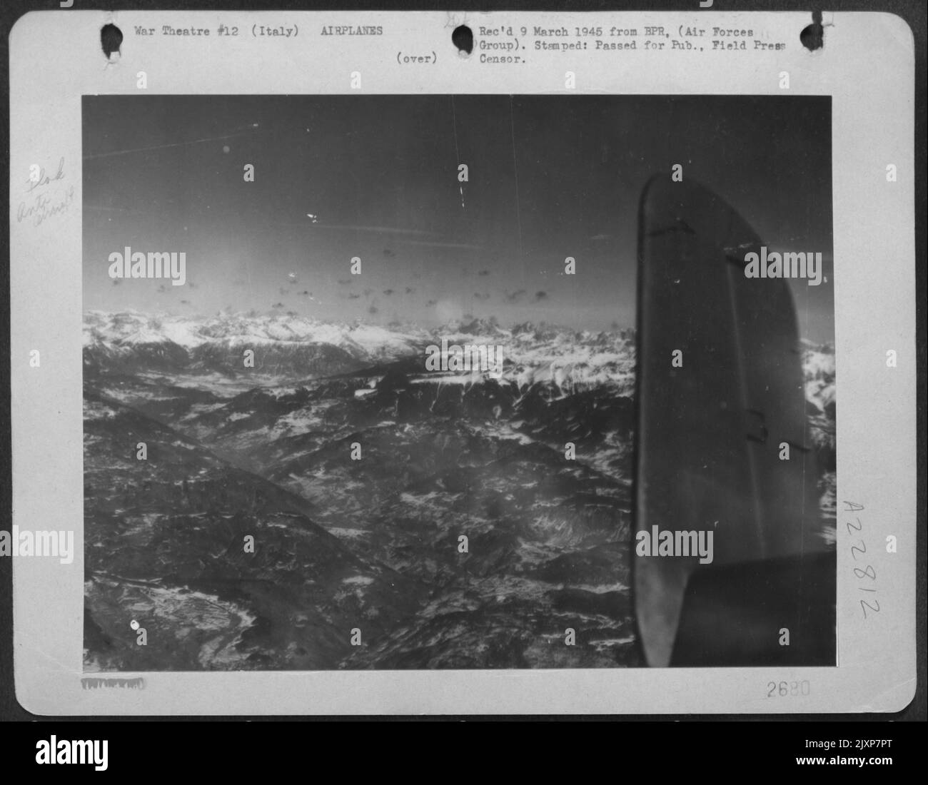 Heavy German Anti-Aircraft Fire Against North American B-25 Mitchells Of The 12Th Af Reaches Up And Beyond The Peaks Of The Italian Alps Over Which The Medium Bombers Are Flying In Attacks In The Battle Of Brenner Pass. The Flak Dotted Sky Picture Was Ma Stock Photo