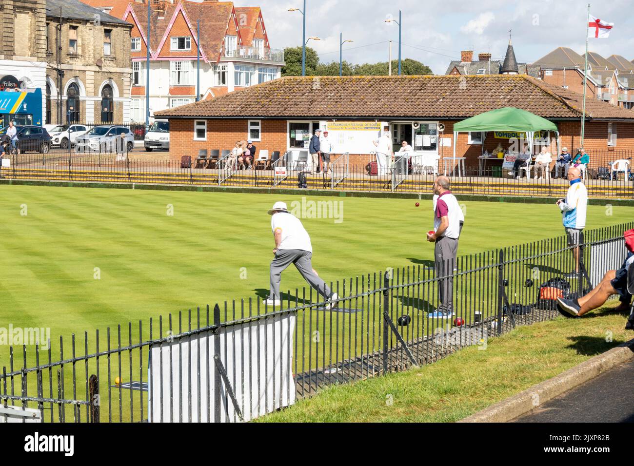 Great Yarmouth bowling Greens with player competing on a summers day