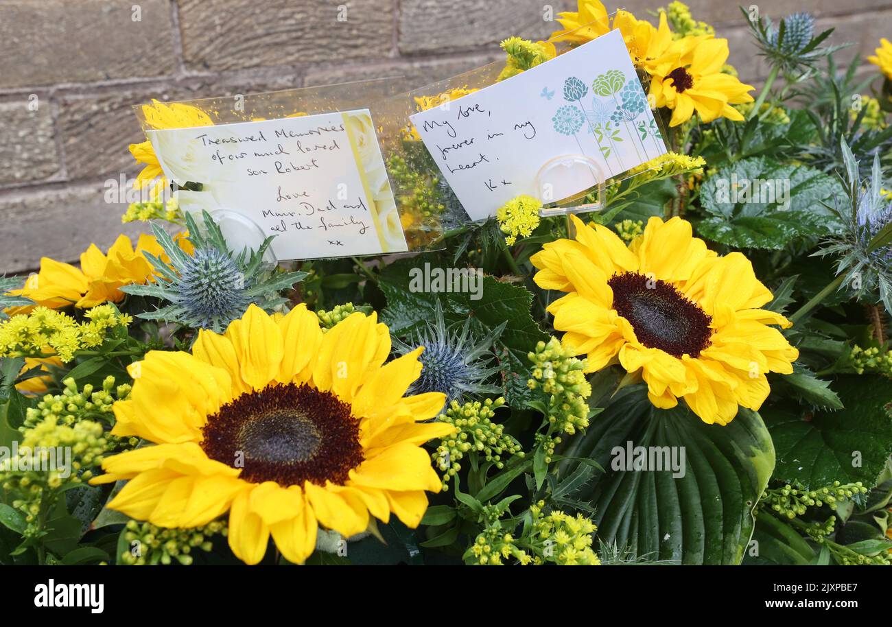 Flowers at Dunfermline Crematorium ahead of the funeral service of Rab Wardell. Wardell died after suffering a cardiac arrest while lying in bed with his partner, Olympic cyclist Katie Archibald, on August 23, days after winning the Scottish MTB XC Championships. Picture date: Wednesday September 7, 2022. Stock Photo