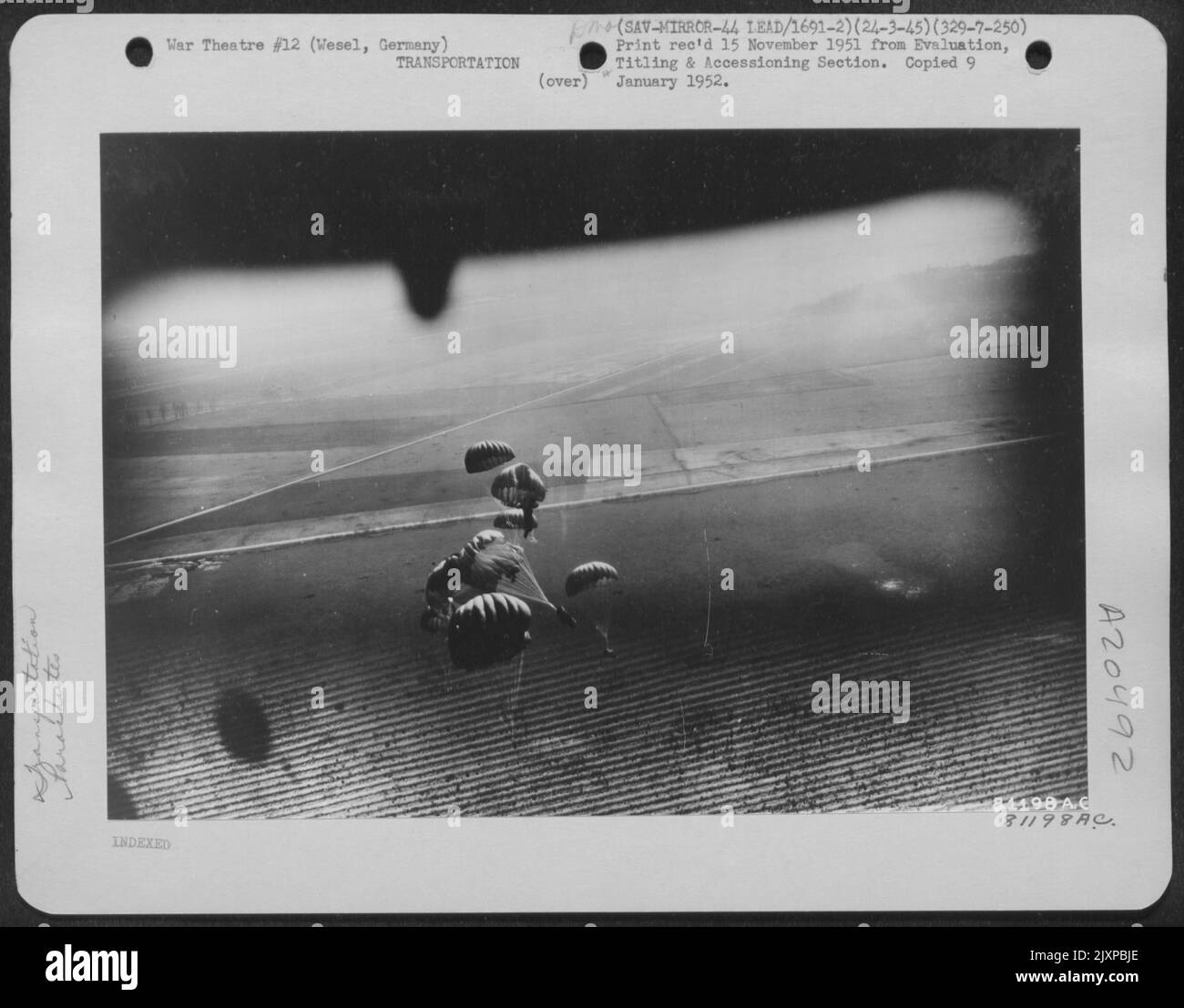 Troops And Supplies Are Dropped Behind The Front Lines At Wesel, Germany, By Consolidated B-24 On 24 March 1945. Stock Photo
