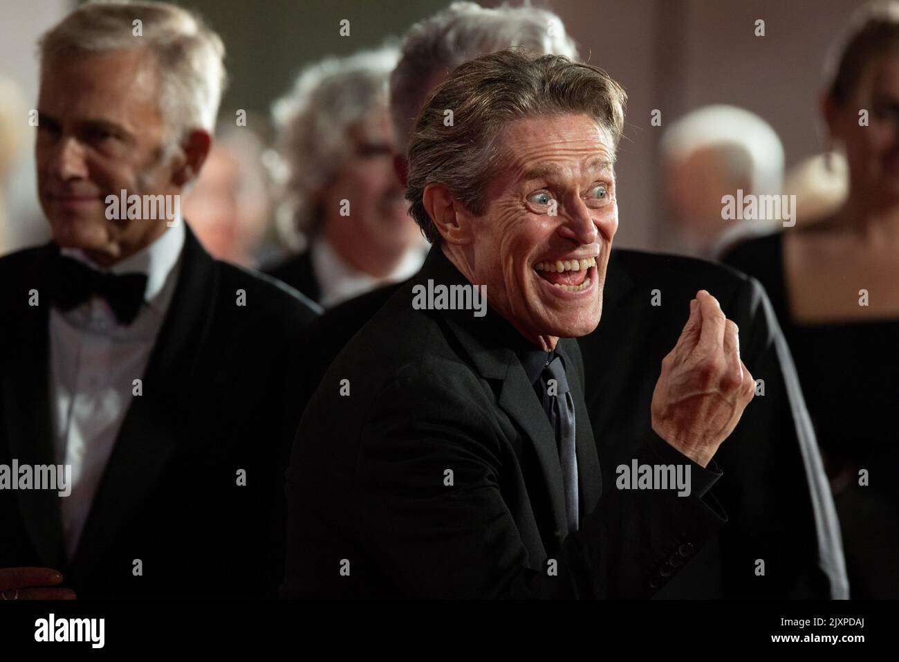 Willem Dafoe and Christoph Waltz attend the "Dead For A Dollar" red