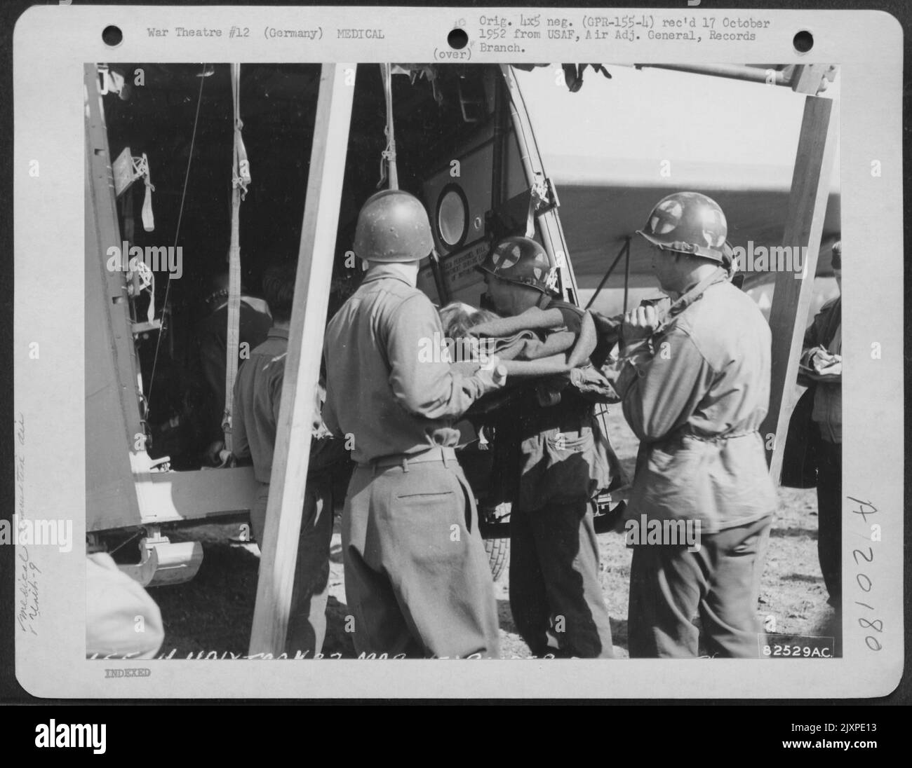 Medics Of The 9Th Troop Carrier Command Load Litter Of Wounded Patients ...