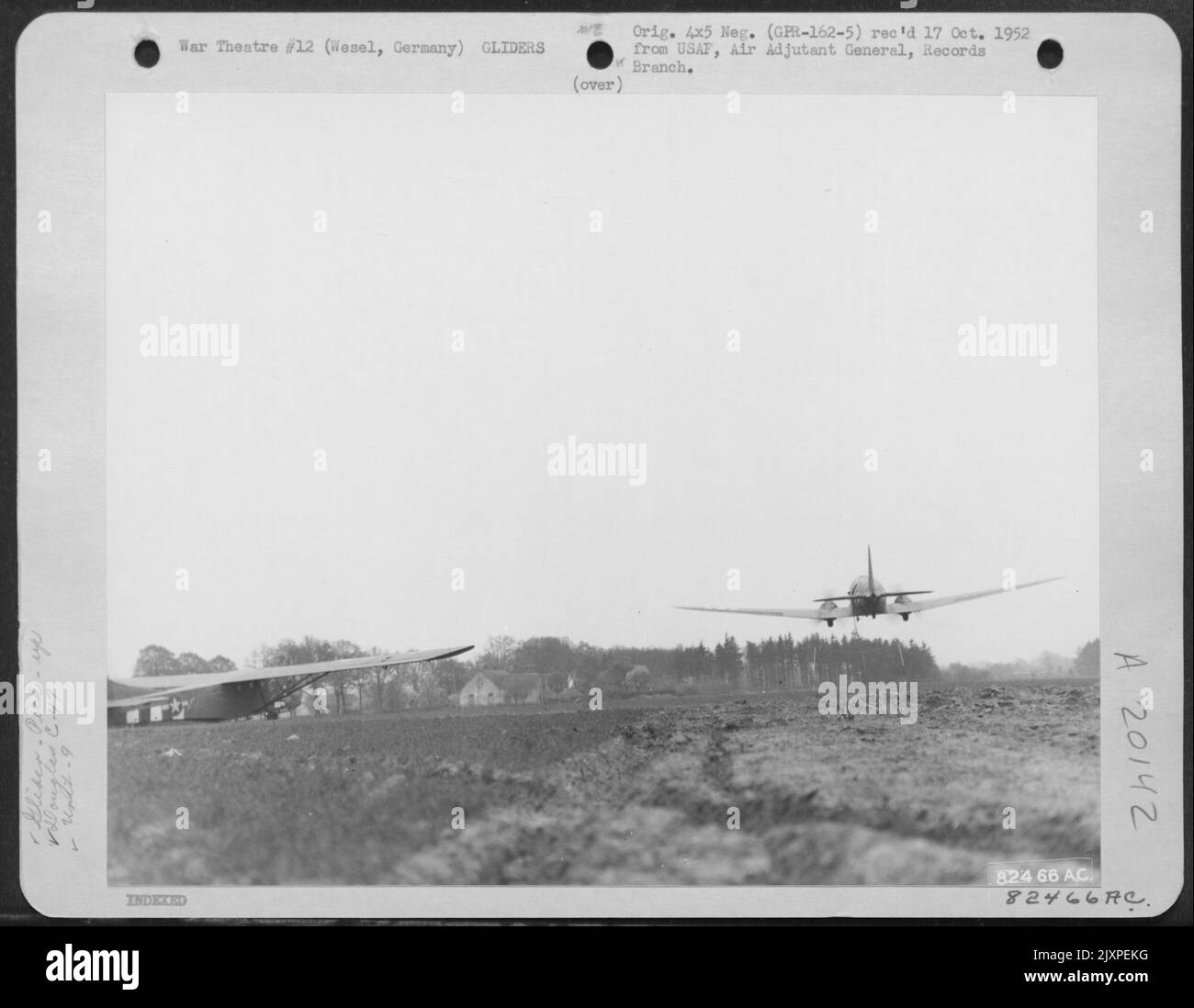 A Douglas C47 Of The 9Th Troop Carrier Command Wings Its Way At Low
