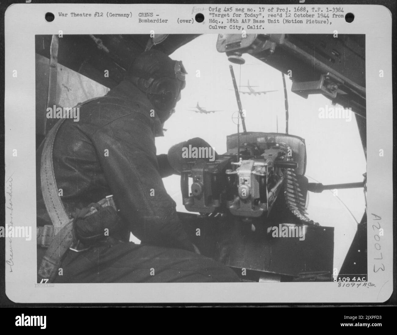 Flying To The Target, Somewhere In Germany, The Bombardier Mans The ...