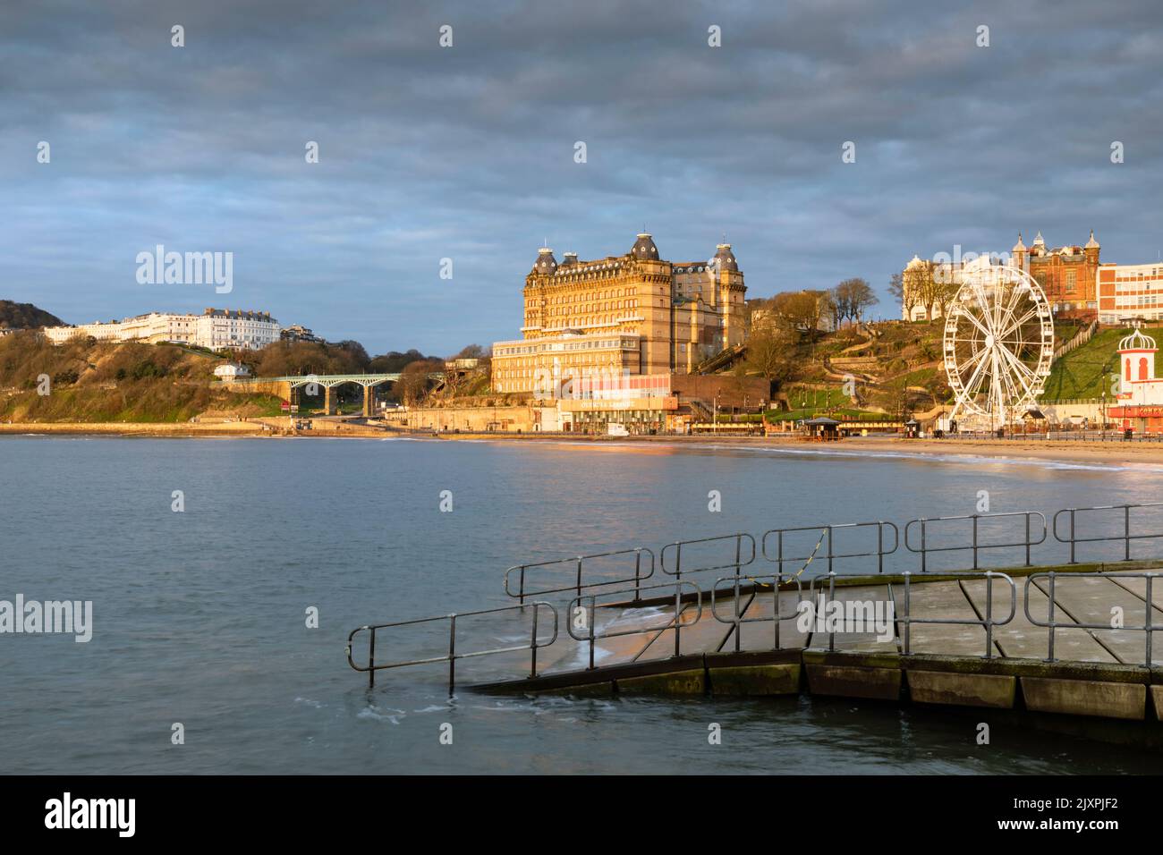 The seafront at Scarborough with the lifeboat stations slipway in the foreground. Stock Photo