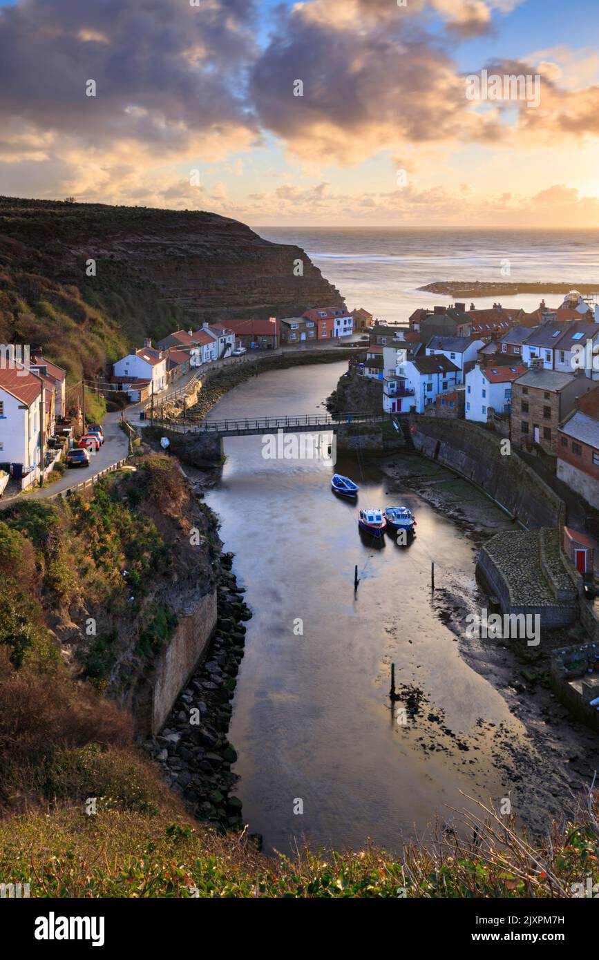The picturesque village of Staithes on the North Yorkshire Coast captured shortly after sunrise. Stock Photo