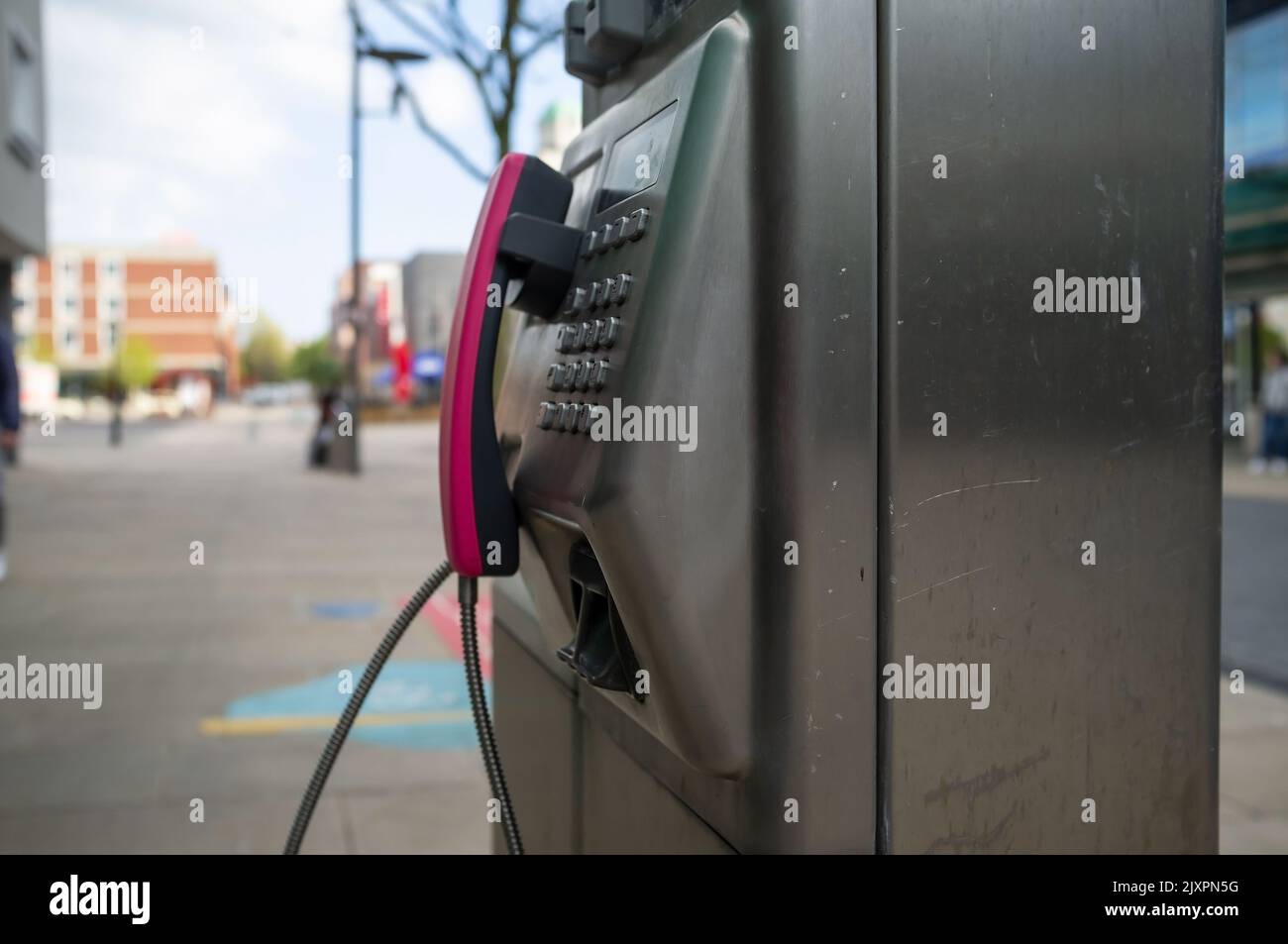 public phone on the street in european city Stock Photo