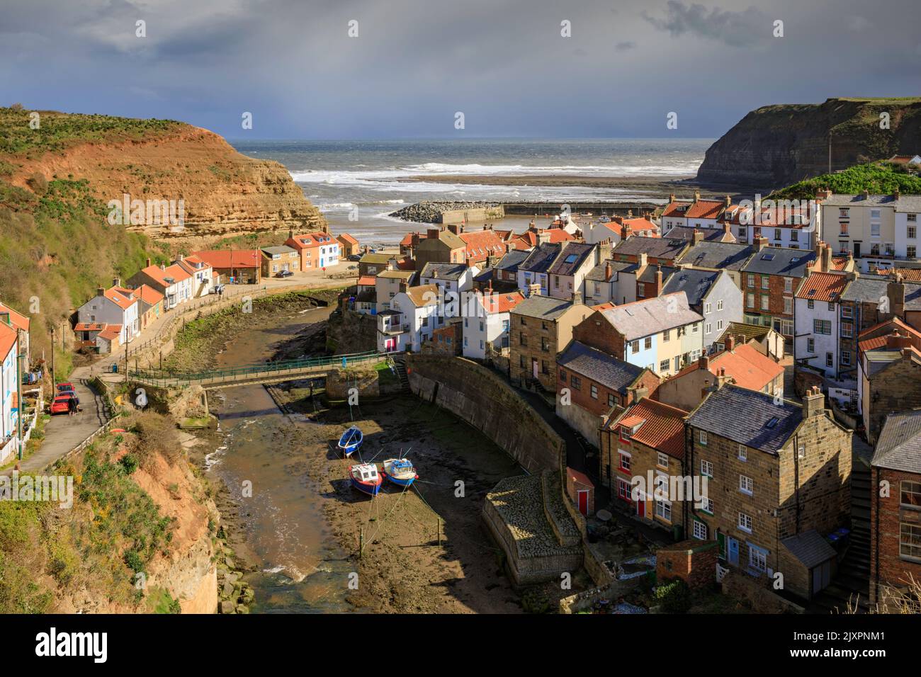The picturesque village of Staithes on the North Yorkshire Coast captured on a stormy afternoon. Stock Photo