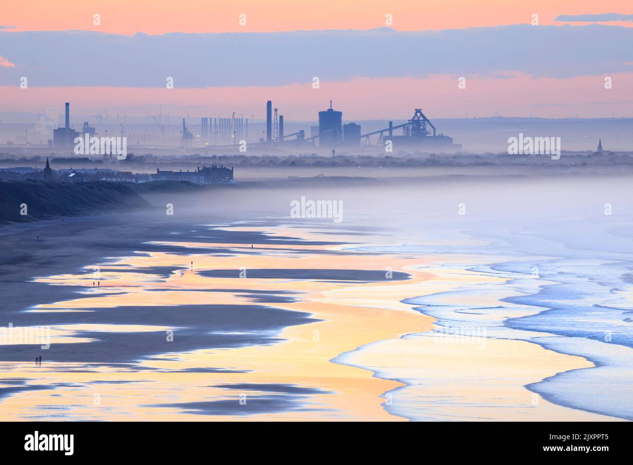 The steelworks at Redcar captured shortly before sunset from the coast path near Saltburn-by-the-Sea. Stock Photo