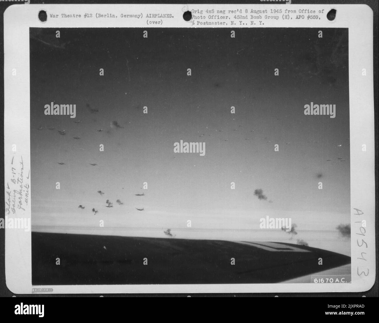 Bursts Of Deadly Flak Explode Around A Formation Of B17 Flying