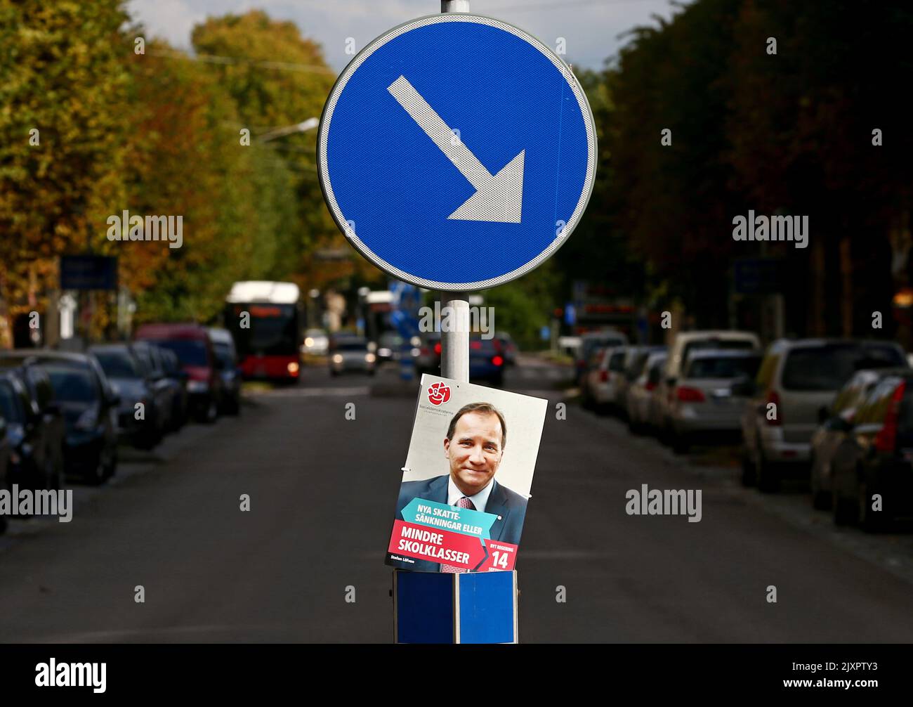 Sweden's future Prime Minister Stefan Löfven, The Swedish Social Democratic Party (In Swedish: Socialdemokraterna), on an election poster at a pedestrian crossing with an arrow pointing to the right. Stock Photo