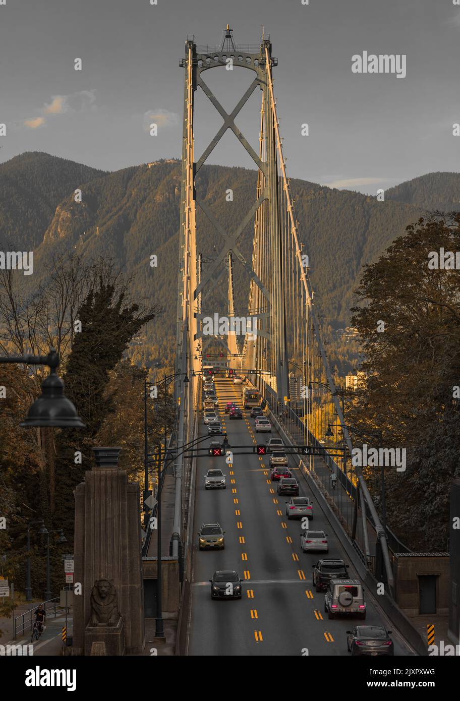 Lions Gate Bridge with traffic in summer Vancouver Canada. View of Lions Gate Bridge from Stanley Park. Built in the 1930s, Vancouver's Lions Gate Bri Stock Photo