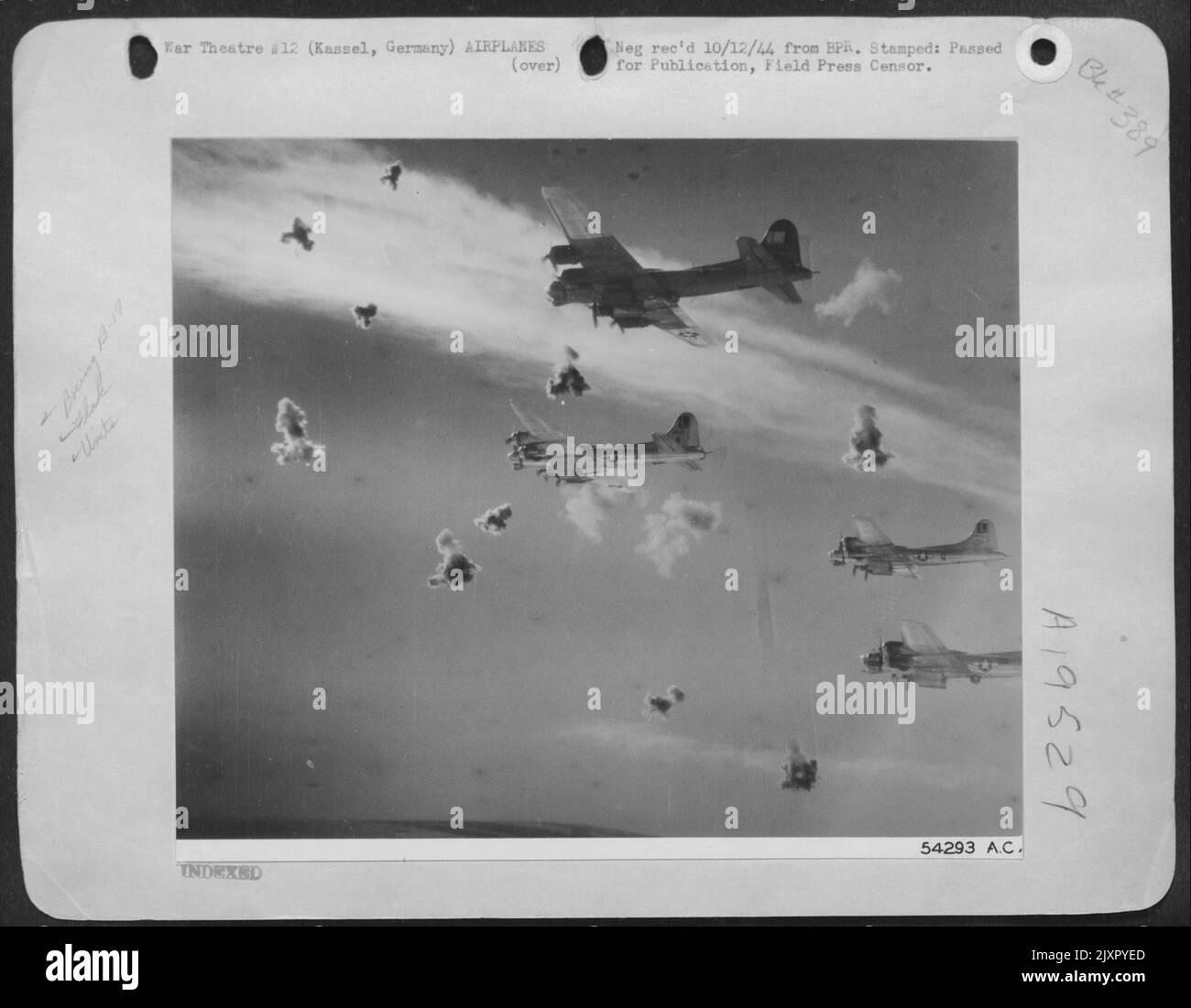 Bursts of deadly flak explode around a formation of Boeing B17 Flying