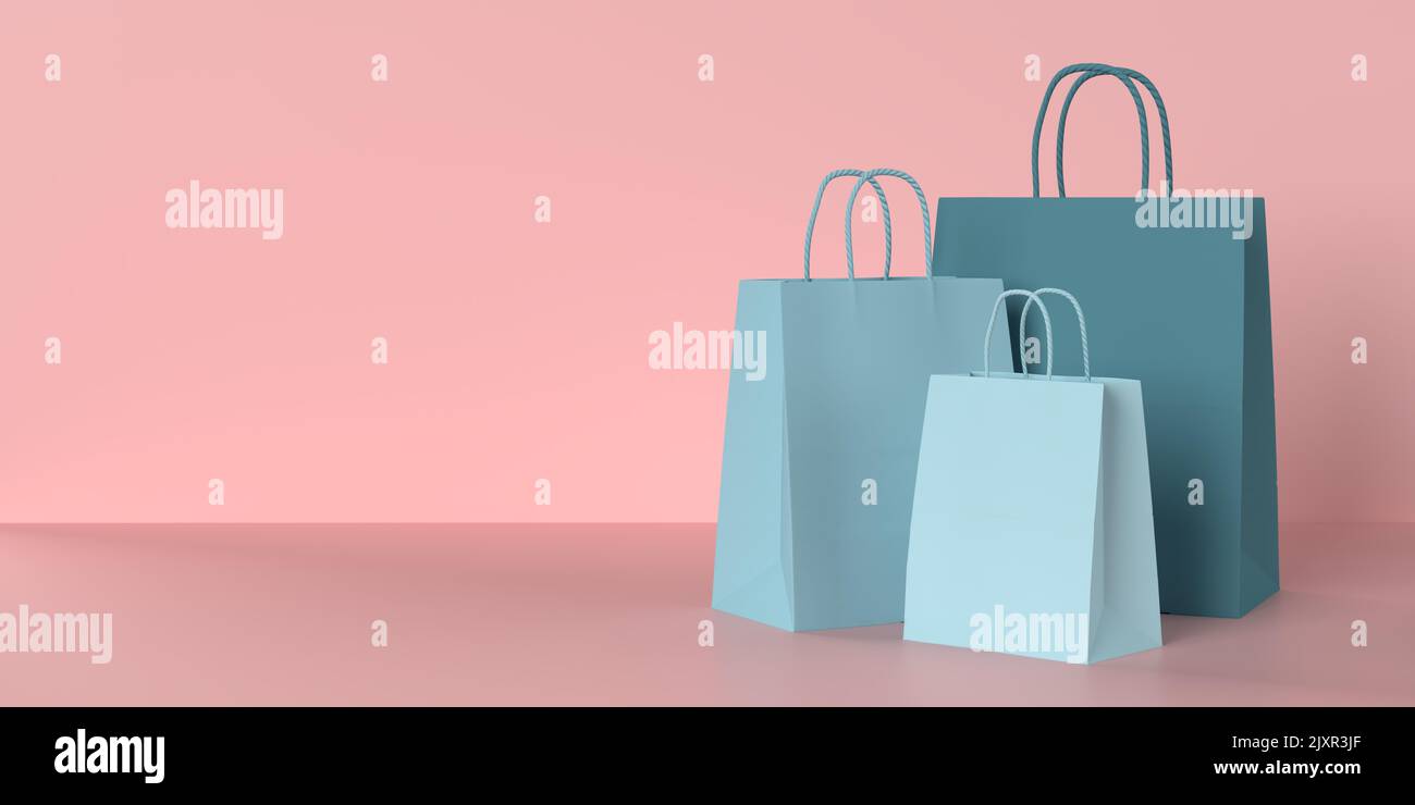 Realistic empty blue paper bags on pink background, copy space text. Online shopping concept. 3d render illustration. Creative design sale event card Stock Photo