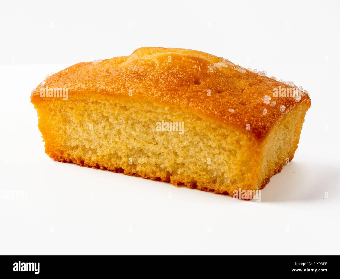 Madiera vanilla  loaf tin cake isolated on a white background Stock Photo