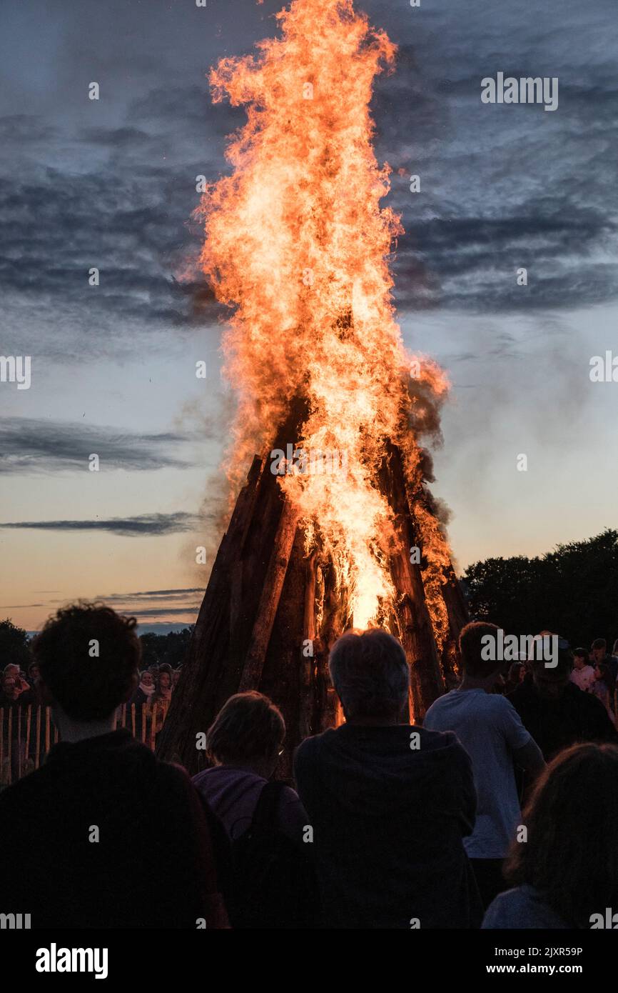 The beacon burns brightly as part of the Haslemere celebrations for the Queen's Platinum Jubilee. Stock Photo