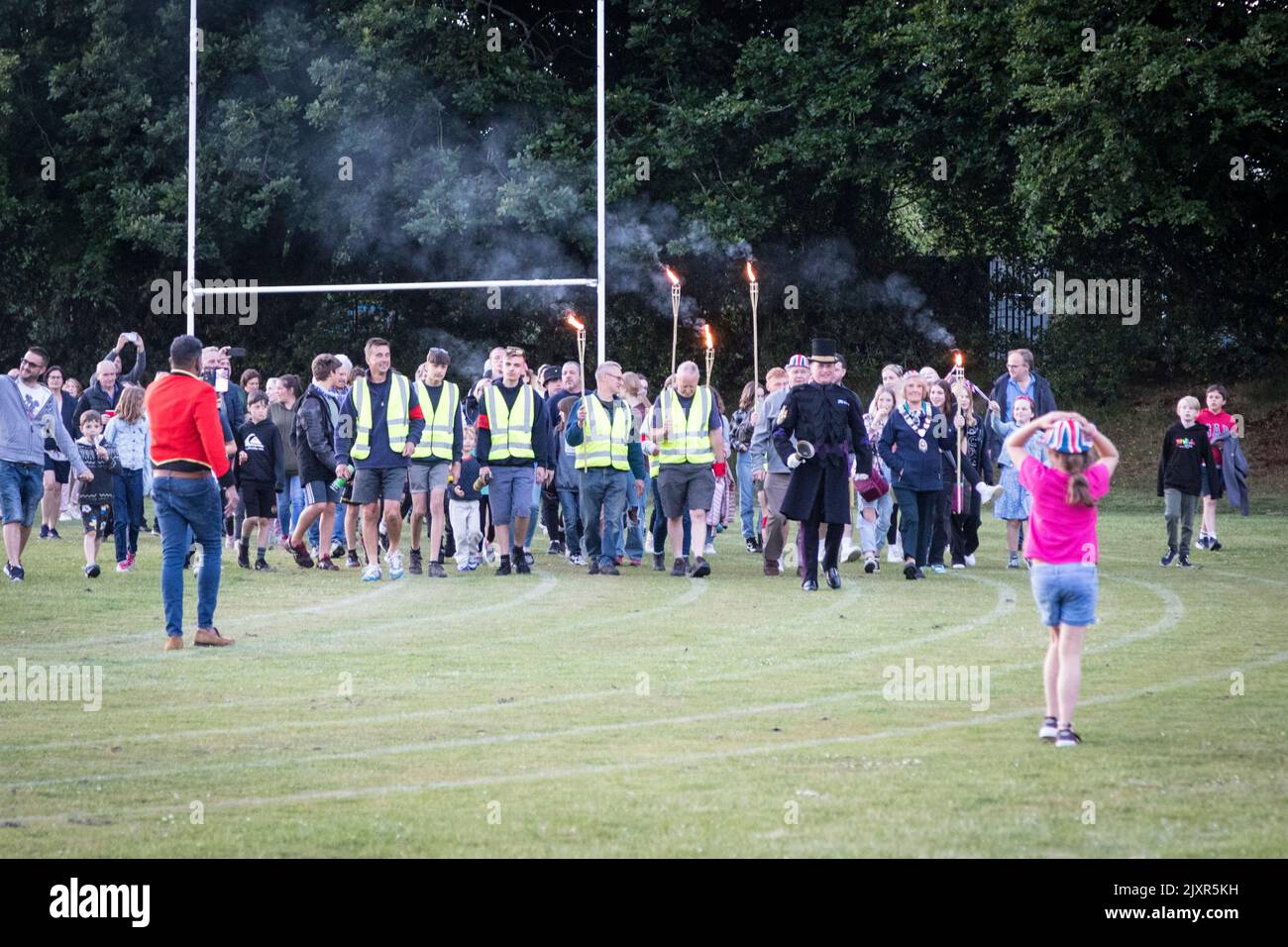 Torch party make their way to the beacon as part of the Haslemere