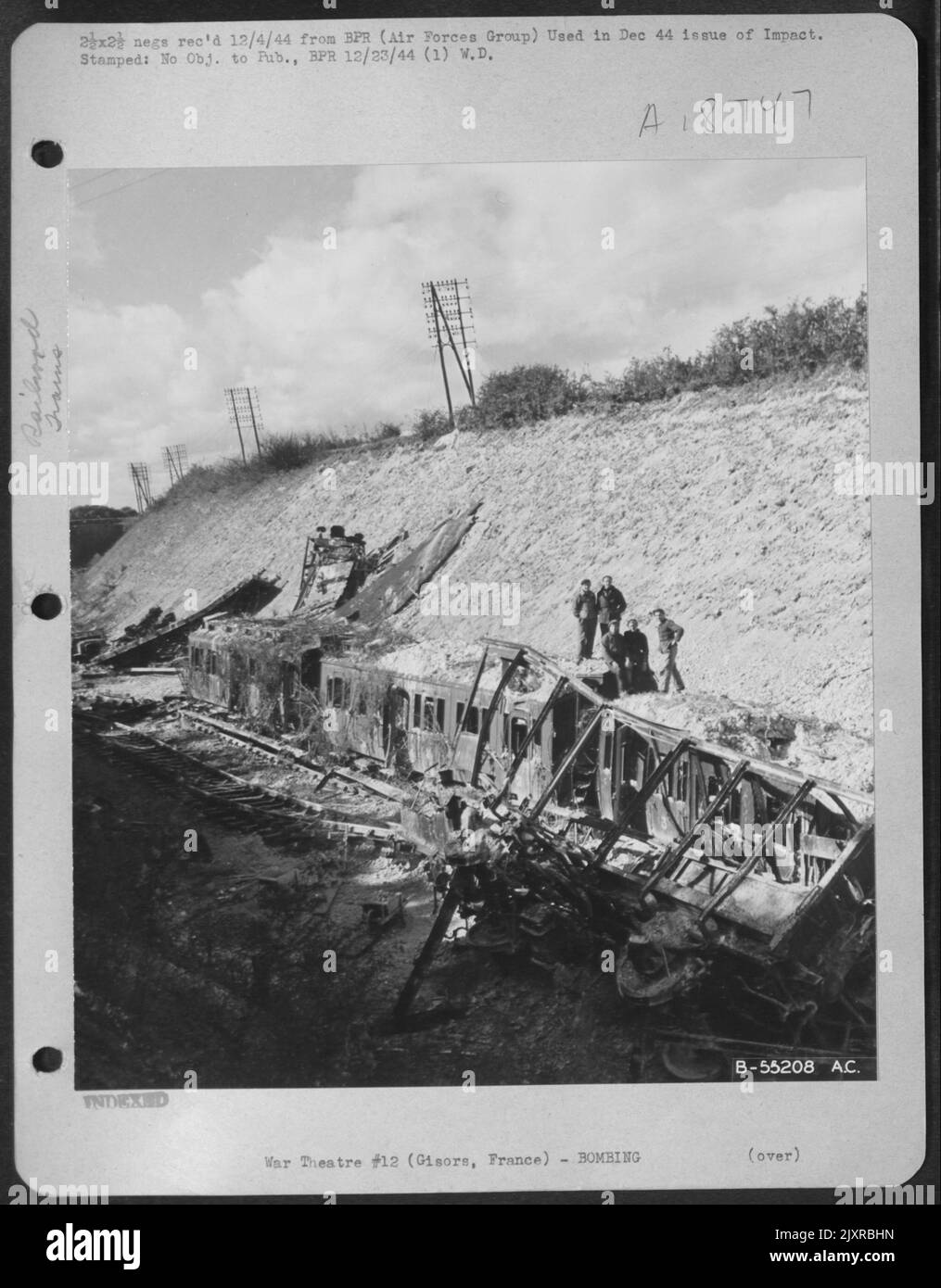 Gisors, France-Ten 500 lb. bombs and fancy strafing by P-47s did the job on this German troop train. Stock Photo