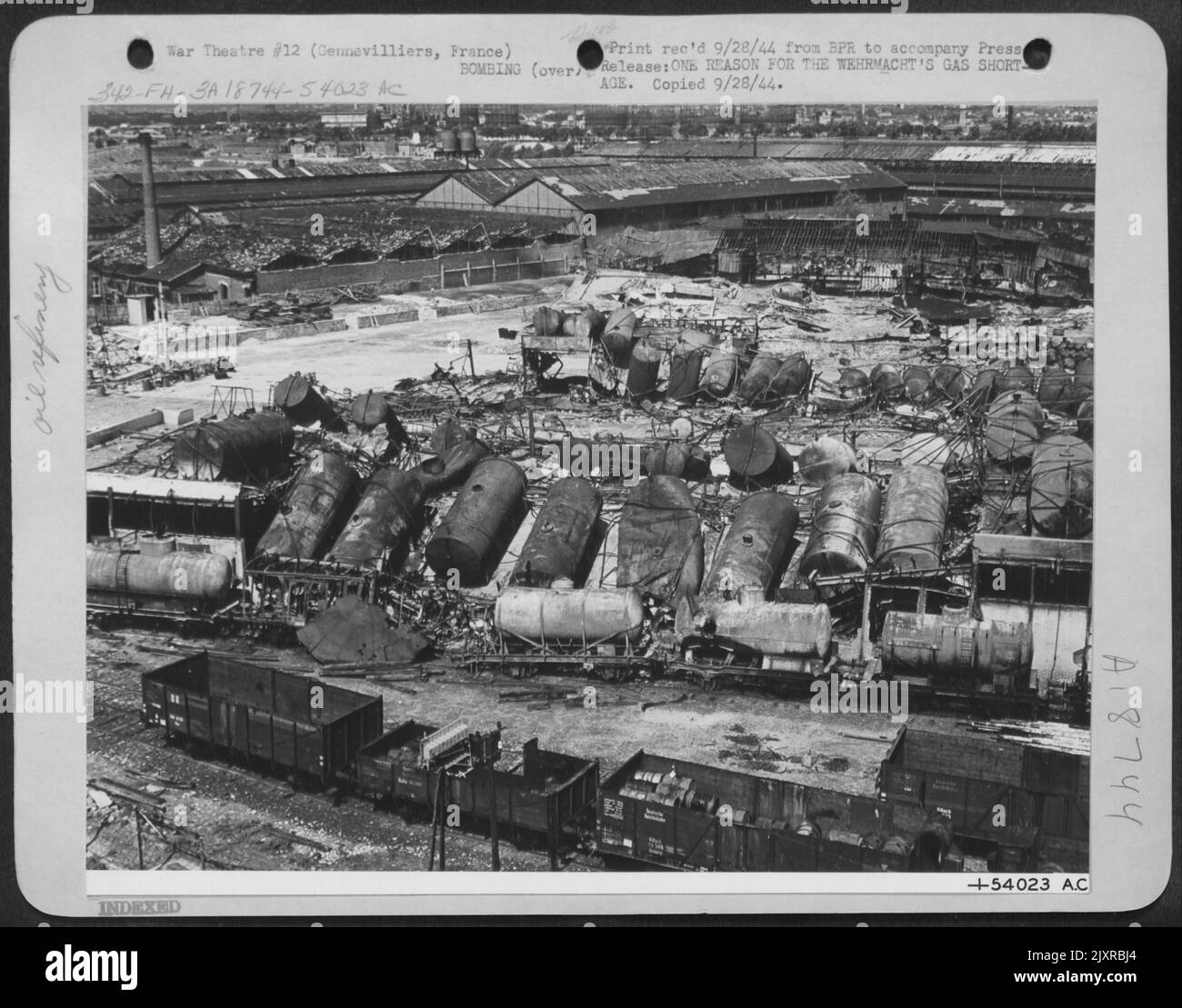 ONE REASON FOR THE WEHRMACHI'S GAS SHORTAGE. This mass of junk as once a busy section of the Compagnie Industraills Maritime, huge gasoline and oil depot at Gennevilliers in the outskirts of Paris, through which Frenchmen said, the Germans moved Stock Photo