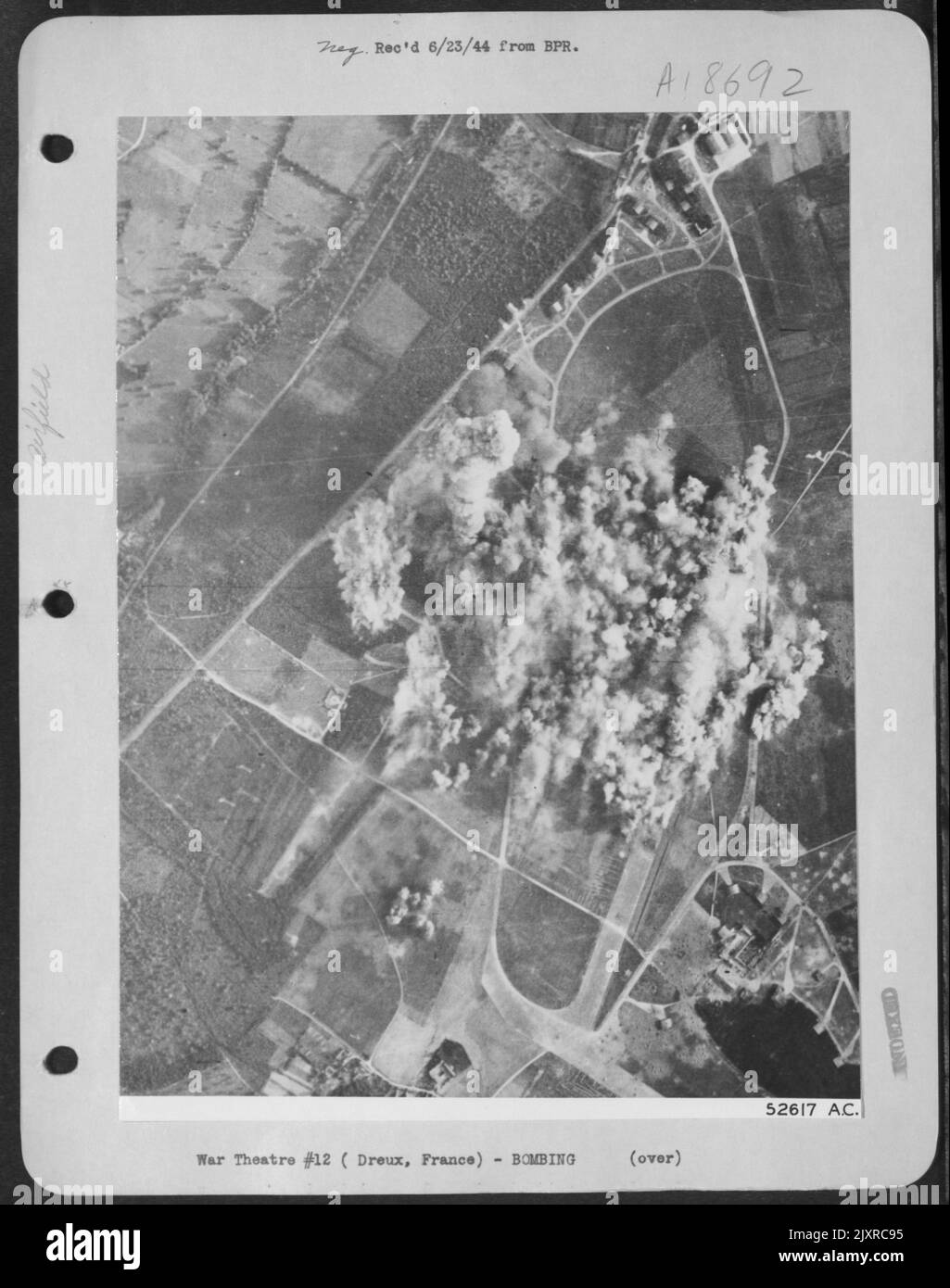 High explosive bombs blanket the center of the Dreux airdrome in