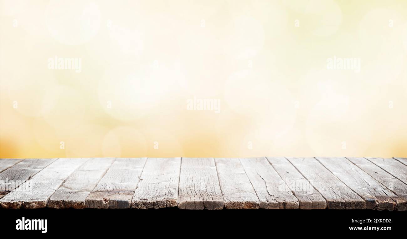 Wooden table and autumn bokeh background for your product Stock Photo ...