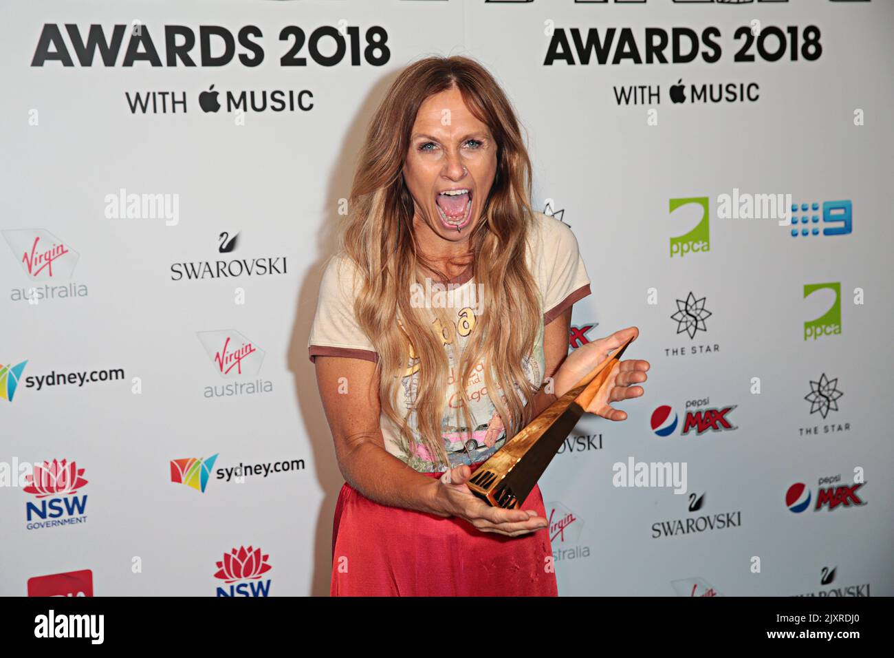 Kasey Chambers poses for a photograph after being inducted to the Hall