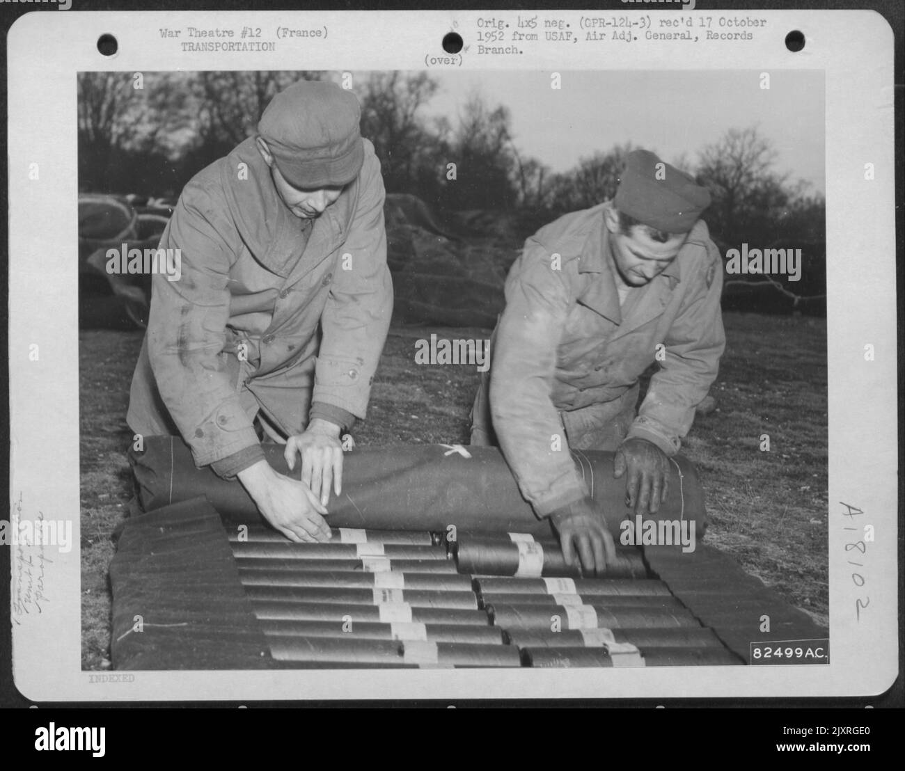 Members Of The 9Th Troop Carrier Command Pack Parapacks At An Air Base ...
