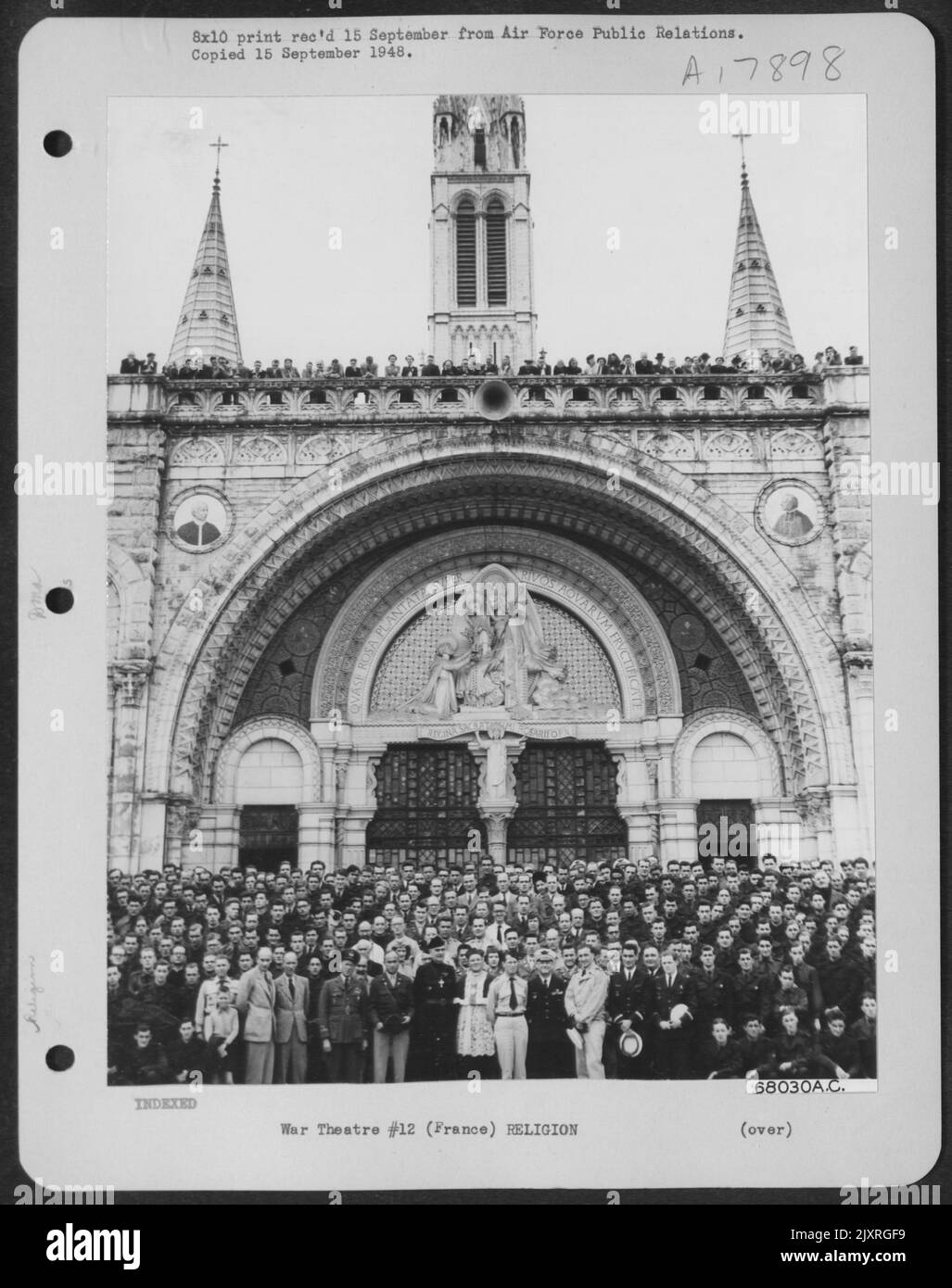 Airmen Of The Us, France, Brazil, Belgium, Italy, The Netherlands, England And Argentina Are Shown As They Gathered In Front Of The Basilica Of The Rosary Church Next To The Grotto In Lourdes, France, During Joint Three-Day Ceremonies Honoring Fliers Kill Stock Photo