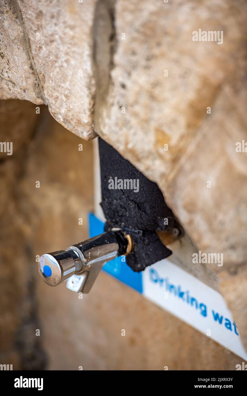 fresh water drinking tap on the beach at the seaside, fresh water on tap for drinking, public water tap, fresh water for drinking, water companies, Stock Photo