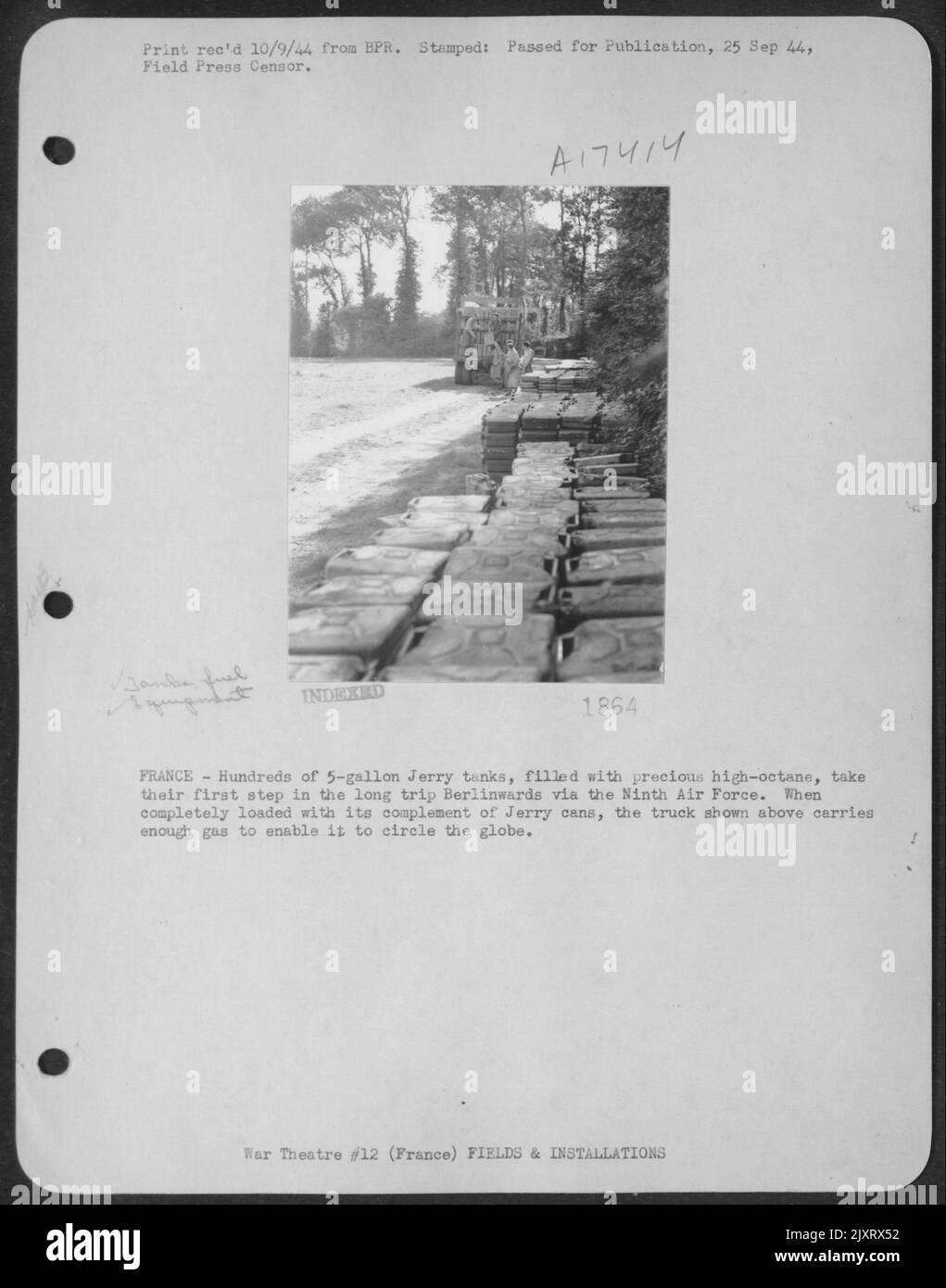 France - Hundreds Of 5-Gallon Jerry Tanks, Filled With Precious High-Octane, Take Their First Step In The Long Trip Berlinwards Via The Ninth Air Force. When Completely Loaded With Its Complement Of Jerry Cans, The Truck Shown Above Carries Enough Gas To Stock Photo