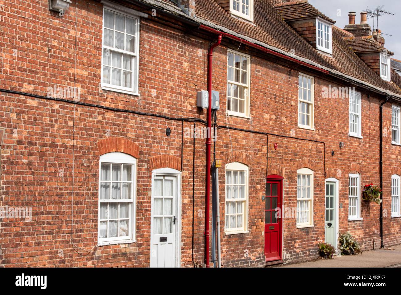 row of red brick built terraced houses in wareham in dorset uk, terrace