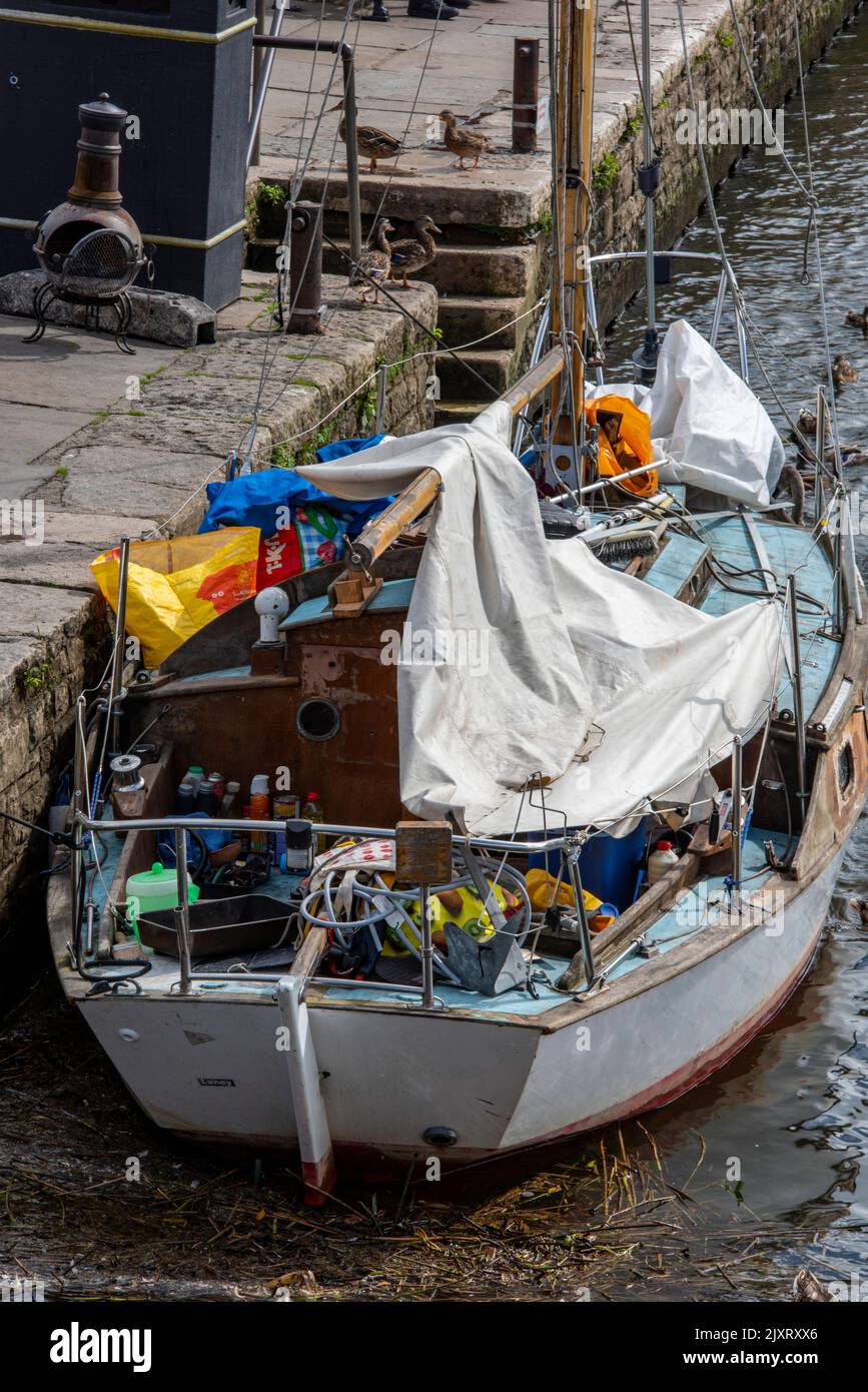 shabby old sailing yacht on the quay at wareham in dorset, old cruising
