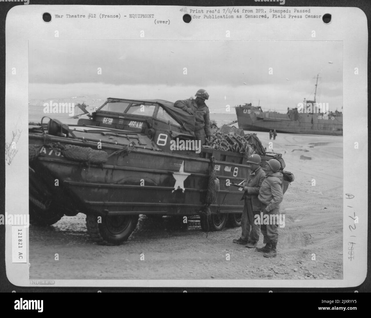 Ssgt George Blinkinsop, (Center) Of Clinton, Iowa, Checks Off Another 'Duckload' Of Ammunition Destined For The Guns Of 9Th Air Force Planes Operating From Temporary Landing Strips In France. Service Soldiers Re-Arm And Re-Fuel Planes. Stock Photo