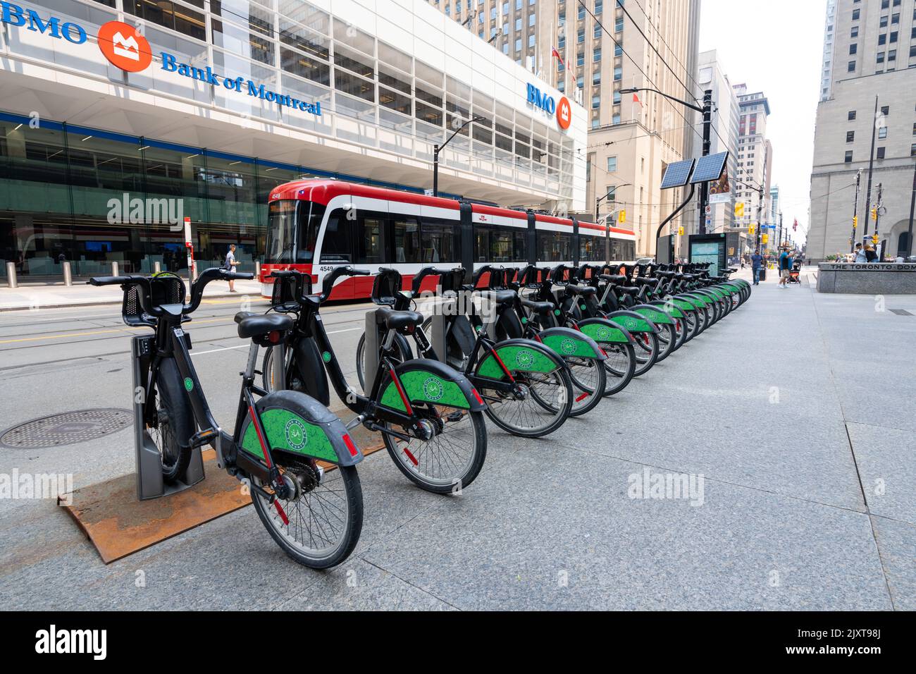 Bike Share Toronto bicycle-sharing system. King Street West streetcar station. Stock Photo
