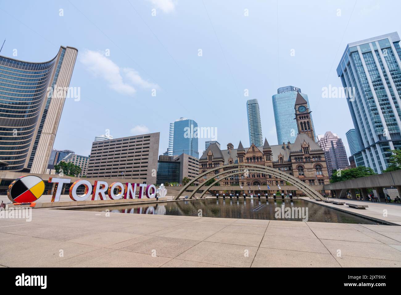 Toronto, Ontario, Canada - July 19 2021 : Fountain at Nathan Phillips Square. Toronto Sign. Stock Photo