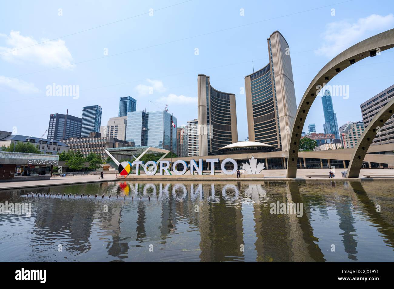 Toronto, Ontario, Canada - July 19 2021 : Fountain at Nathan Phillips Square. Toronto Sign. Stock Photo
