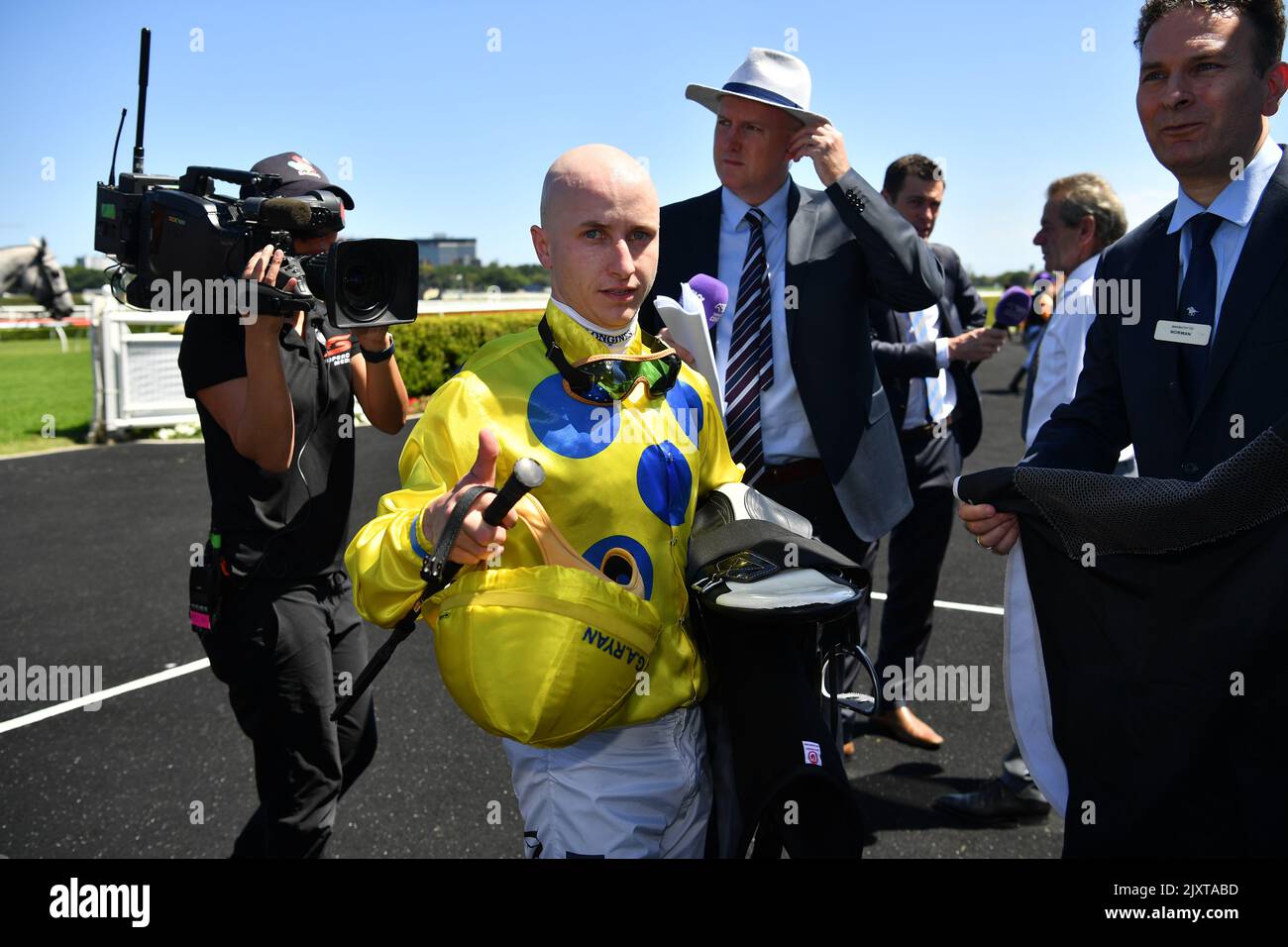 Jockey James Innes Jnr returns to scale after riding Miss Celebration